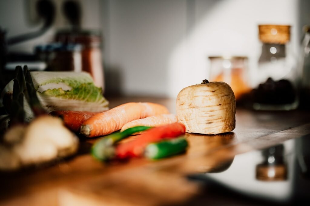 Chopped vegetables on a cutting board, illustrating small-batch prep with a mini food processor