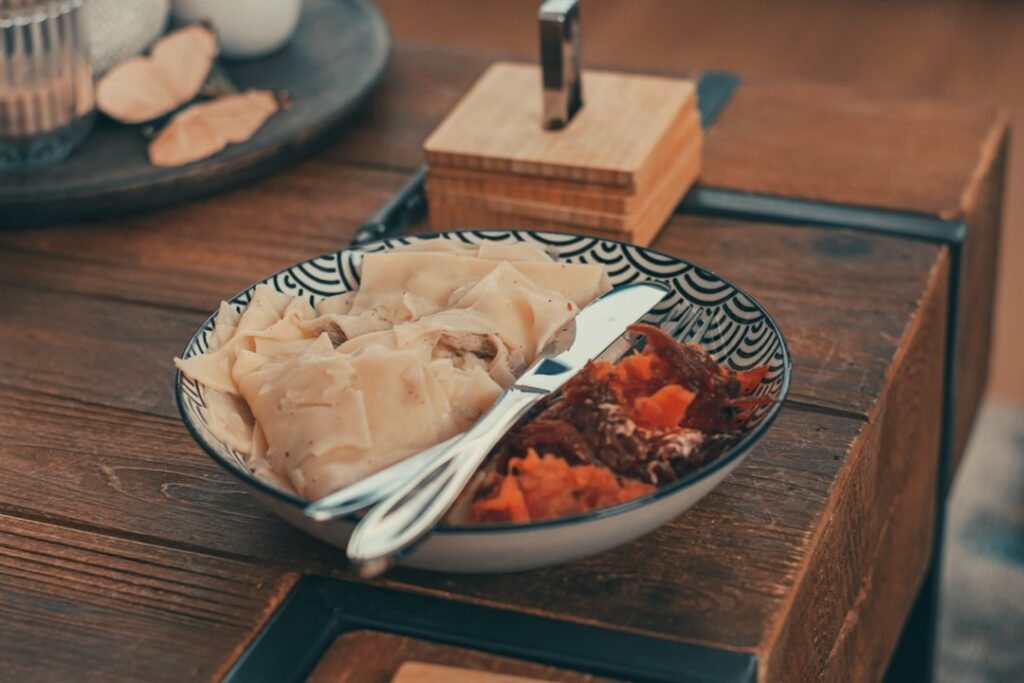 Bowl of freshly cooked rice on a kitchen table