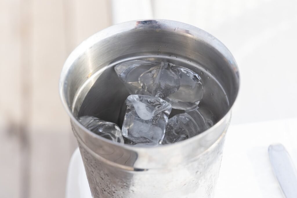 Ice cubes in a metal bucket for a countertop ice maker guide