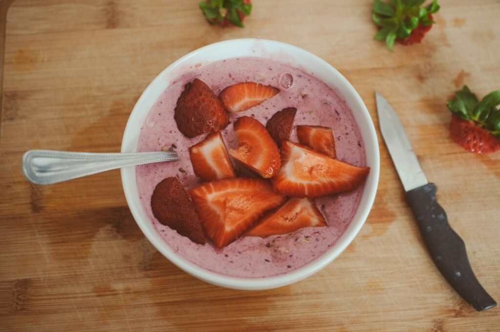 Cut strawberries prepared for personal blender troubleshooting