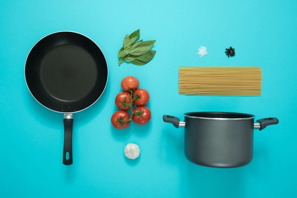 Pot of pasta cooking on a cooktop, illustrating induction cooktop noise