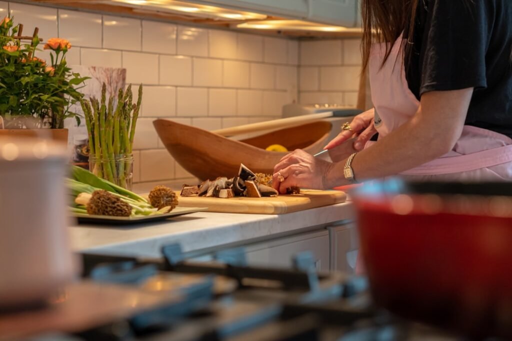 Person chopping vegetables during small-batch food preparation